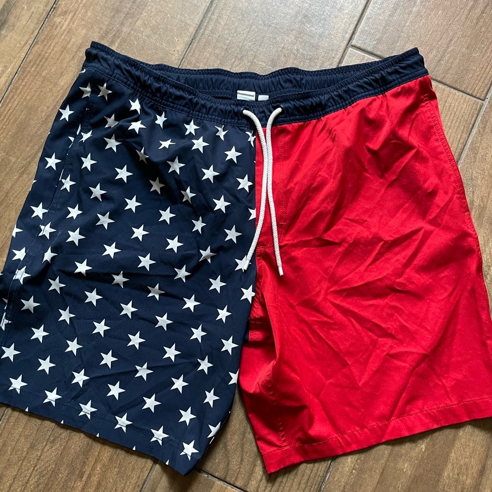 Men’s patriotic swim trunks. Only worn once. They were too big.